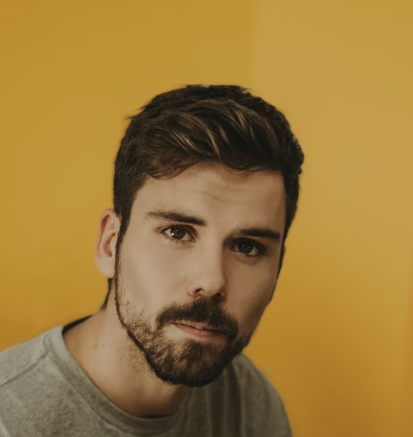 Man portrait yellow background
